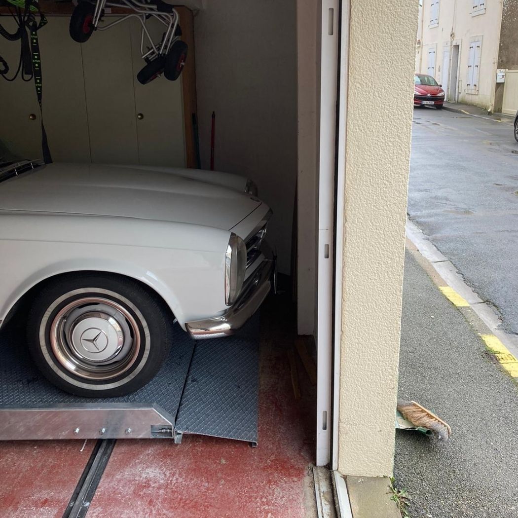Système multiparking avec translateur de voiture